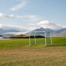 Photo art by Franz Sussbauer: green soccer field with glacier in the background