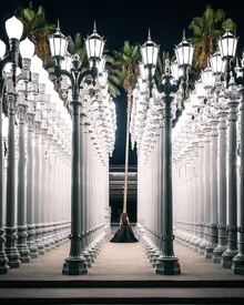 Photo art by Dimitri Luft: night view of a city with lanterns and palm trees