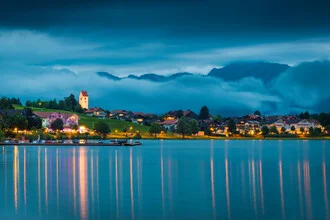 Evening at Hopfensee with mountains in the background and soft colors.