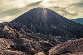 Photo art by Timo Keitel: serene sunrise over volcanic landscape