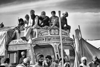 Photo art by Jagdev Singh: People traveling in India, lively street scene with a bus.