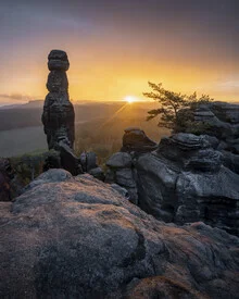 Photo art featuring mist over the Pfaffenstein in the Elbsandsteine mountains at sunrise