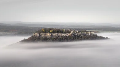 Photo art by Ronny Behnert: Königstein Castle in the fog of the Elbe Sandstone Mountains.