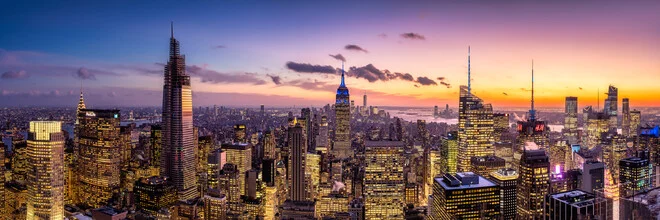 Photo art by Jan Becke: Manhattan skyline at night with glowing skyscrapers.