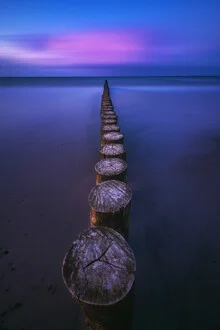 Wavebreakers at the Baltic Sea near Heiligenhafen during blue hour