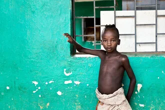Portrait of a young Ethiopian boy with gentle features and a thoughtful expression