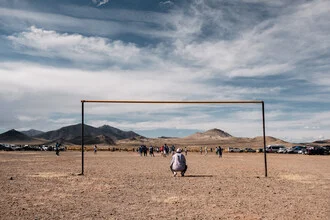 Photo art by Felix Dorn: A football on a field in Argentina