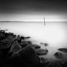 Photo art by Stephan Opitz: fishing nets by the water in soft gray tones