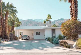 Photo art by Roman Becker: Palm Springs villa with palms and blue sky.