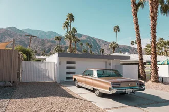Photo art by Roman Becker: classic Chrysler in front of palms in the Mojave Desert
