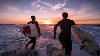 Surfing on the North Sea during a calm sunset