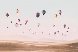 Photo art by Kathrin Pienaar: Hot air balloons over a gentle desert landscape.