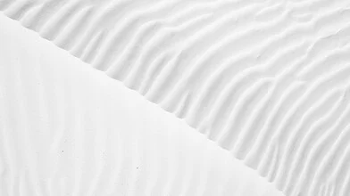 Beautiful sand dune in Australia, soft curves and lines illuminated by sunlight.