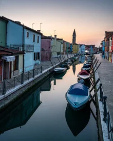Photo art by Ronny Behnert: Sunrise over Burano with soft colors and water reflections.