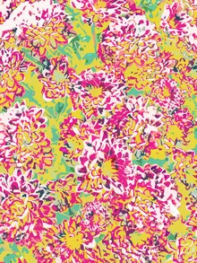Wall art featuring colorful flowers in a lively, bohemian style.