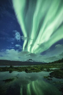 Photo art by Sebastian Worm: Northern lights over a calm fjord in Norway