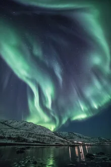 Photo art by Sebastian Worm: Polar light over a fjord in Norway