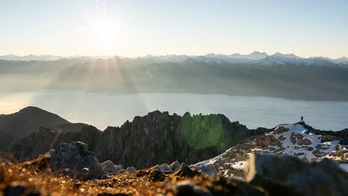 Photo art by Clemens Bartl: serene mountain landscape with sea of clouds in Tyrol