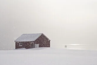 Photo art by Victoria Knobloch: Winter landscape with a cabin and snowy fjord.