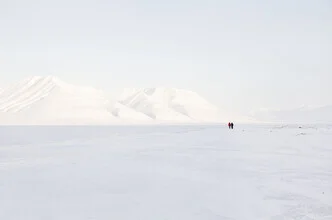 Photo art by Victoria Knobloch: walkers in a white winter landscape in Norway.