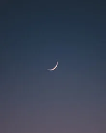 Photo art by Philipp Heigel: gentle crescent moon over a night landscape.