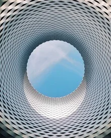 Photo art by Roc Isern: minimalist image of a donut under the sky