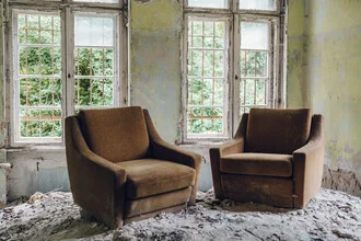 Photo art by Anke Dörschlen: An abandoned room with an old armchair by the window.