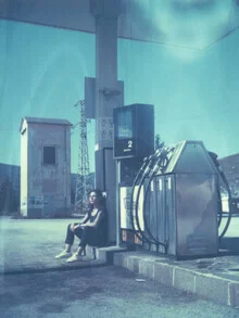 Lovely photo of a woman at a gas station in Italy