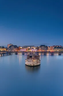 Photo art by Iman Azizi: calm boat on the Spree at blue hour