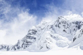 Photo art by Julian Bückers: snow-covered mountain with glacier in winter light