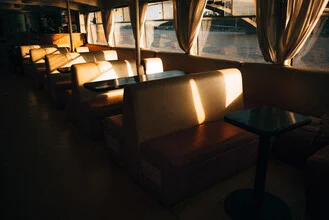 Photo art by Marco Leiter: calm scene on a boat at sunset in Ukraine