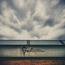 Photo art by Klaus-peter Kubik: historic building beneath a cloudy sky