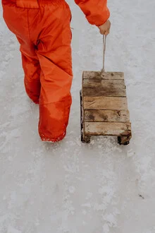 Photo art by David Wurth: children in the Himalayas with sled in a snowy landscape.