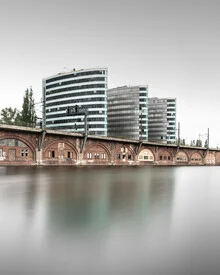 Photo of Trias Towers in Berlin, reflected in water with a minimalist mood.