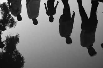 Photo art by Jagdev Singh: People reflecting while walking on the street