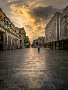 Photo art by Iman Azizi: sunrise over Valletta with soft clouds