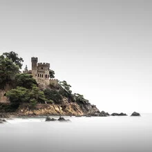 Beautiful photo art by Ronny Behnert: castle by the Mediterranean with calm waters.