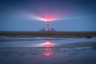 Photo art by Martin Wasilewski: Lighthouse reflecting in calm waters.