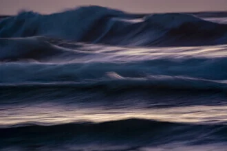 Photo art by Tal Paz-fridman: calm waves beneath a pink sky