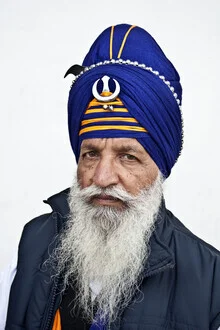 Photo art by Jagdev Singh: portrait of a man with a turban and a friendly smile