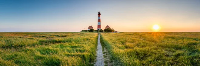 Photo art by Jan Becke: Westerheversand lighthouse at sunset over the North Sea