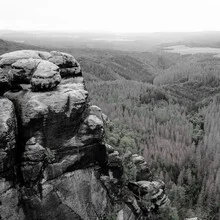 Enchanted landscape with fog over the Elbe sandstone mountains
