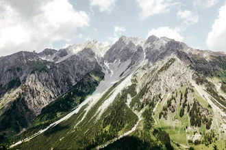 Photo art by Roman Becker: serene mountain landscape with clouds and rocks