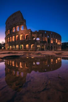 Photo art of the Colosseum in Rome at blue hour, soft lighting and historic architecture.