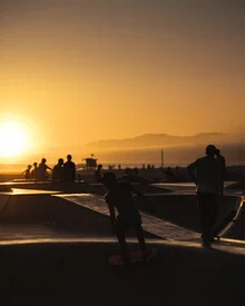 Beautiful image of a skateboarder at sunset in Venice Beach.