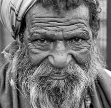 Photo art by Gerhard Blücher: a beggar on the streets of Delhi