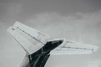 Photo art by Roman Becker: close-up of an airplane tail wing