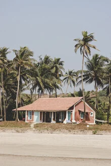 Photo art by Victoria Frost: tropical beach house with palm trees in the background.