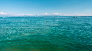 Photo art: serene Lake Constance landscape with gentle waves and blue sky