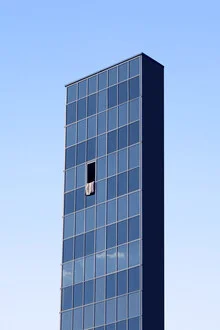 Photo art by Rupert Höller: surreal view of a high-rise building in blue tones